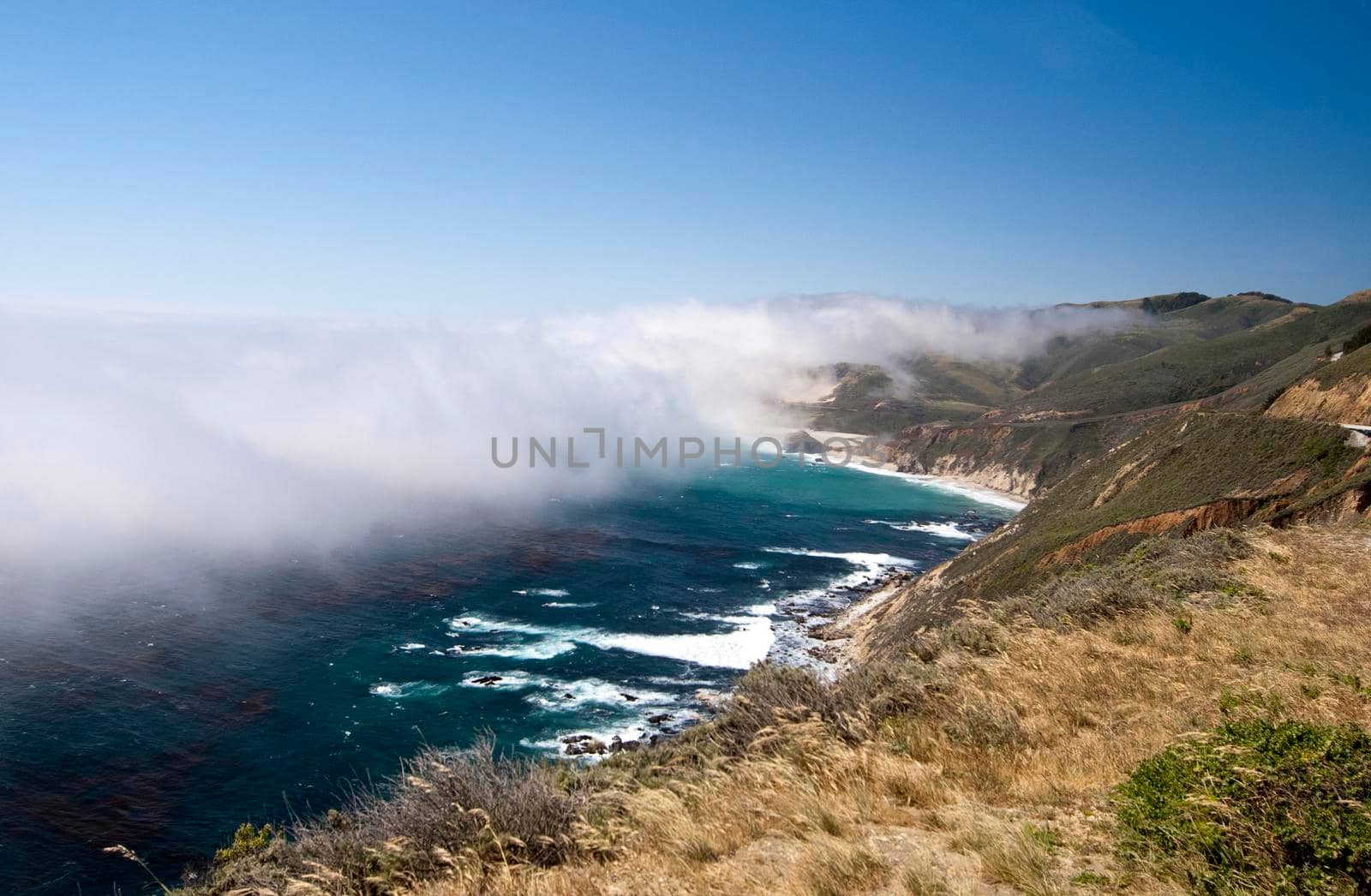 a layer of mist over the bigsur coast line