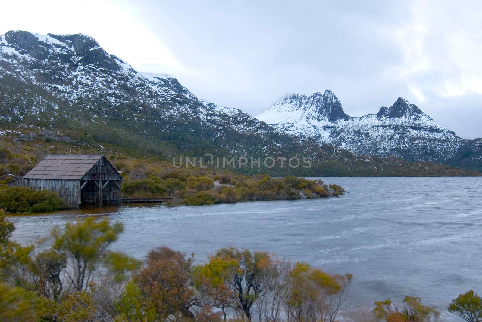 iconic view of dove lake and the boat shed with cradle mountain in the background, Cradle Mountain-Lake St Clair National Park