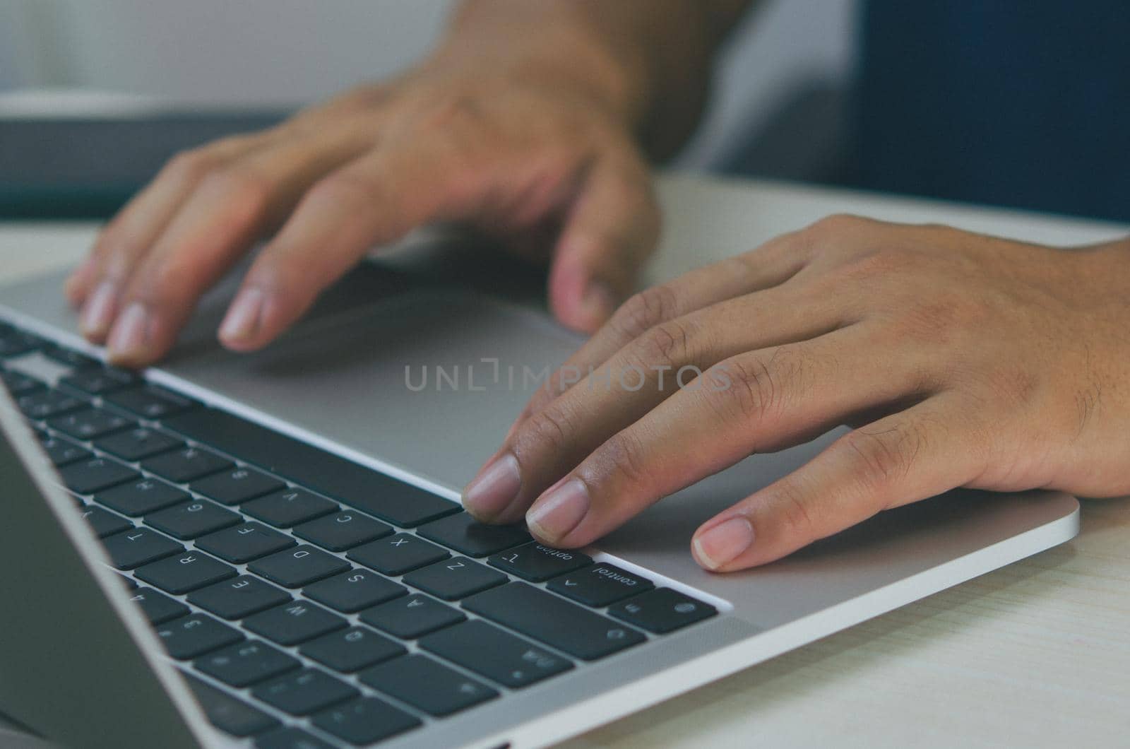 Laptop computer digital technology online. Businessman hand typing keyboard notebook at work communication internet at desk. by aoo3771