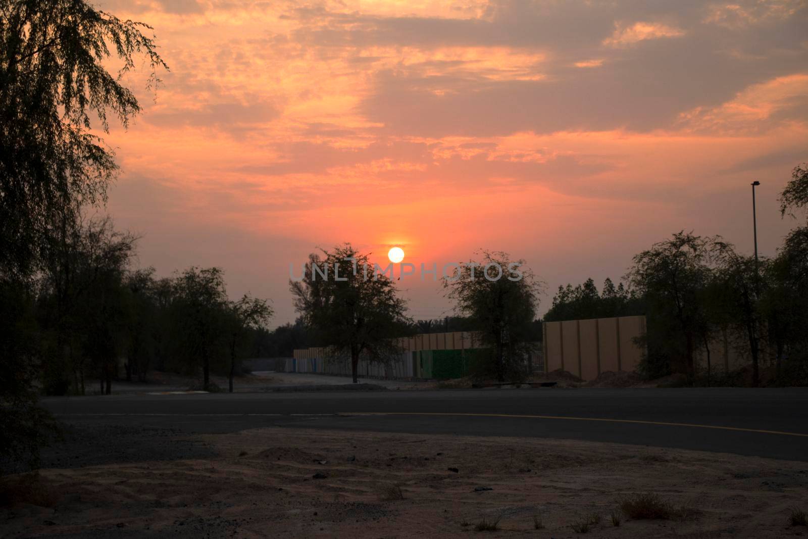 Dramatic sunset and cloudy sky, spotted in one of the remote areas of Dubai city, UAE. Outdoors
