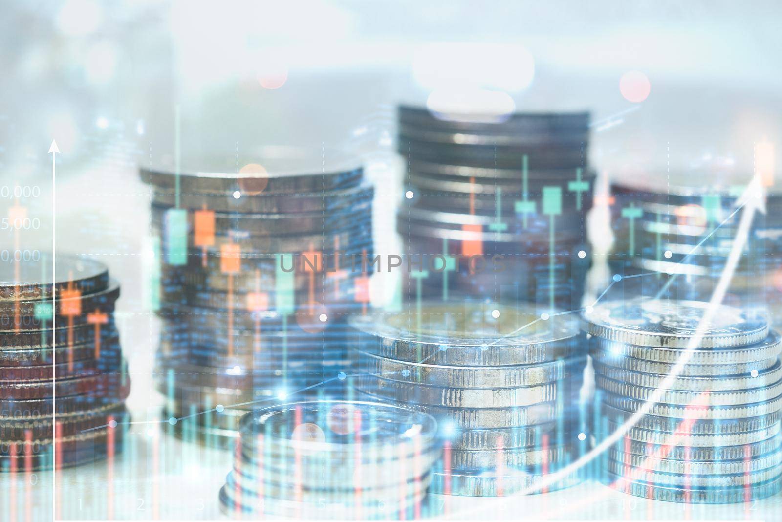 Double exposure Stock market investment trading financial coins with graph on virtual screen. Business saving money accounting economy concept.
