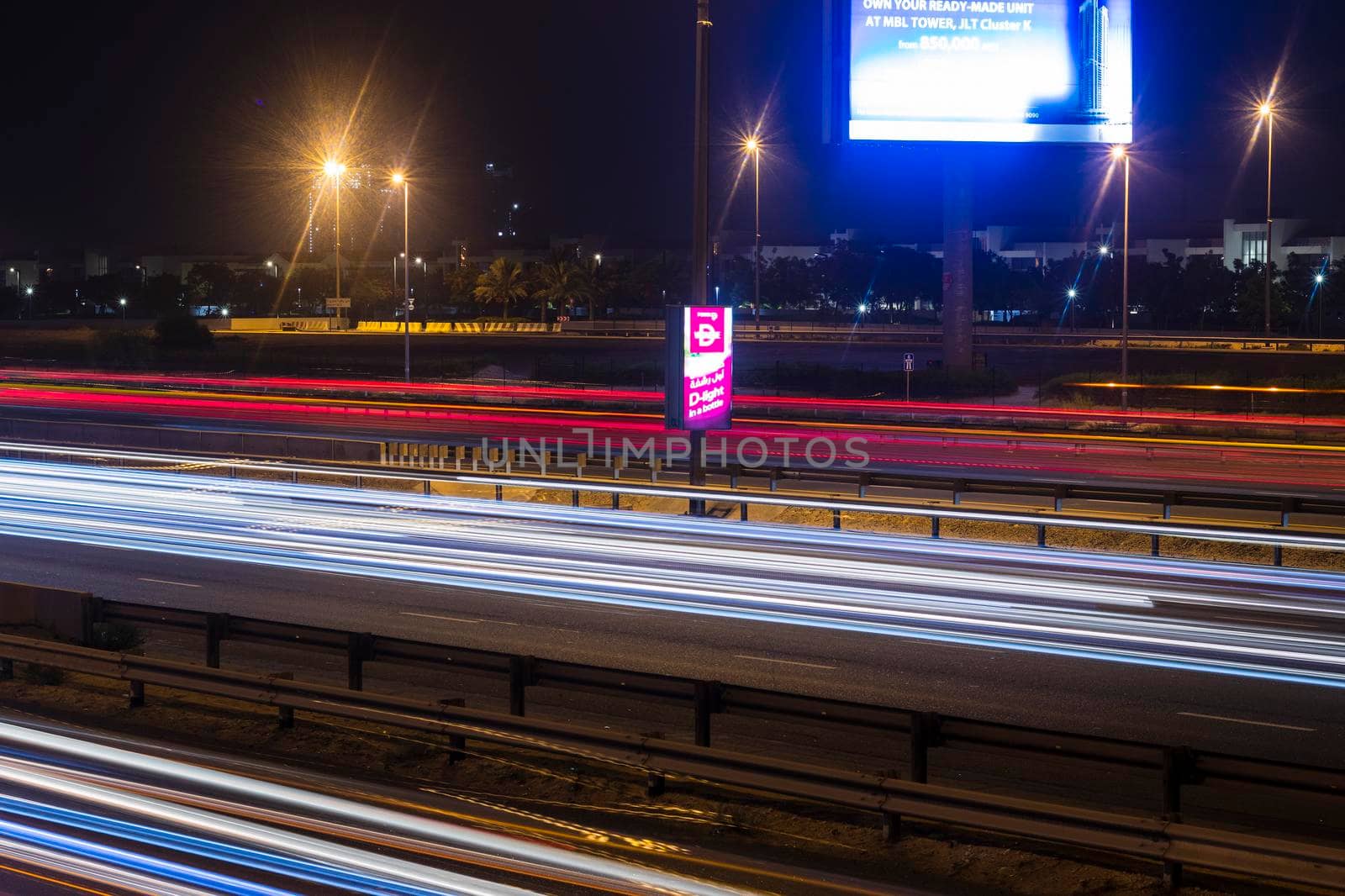 Dubai, UAE - 06.04.2021 Light trails on Al Khail road at night
