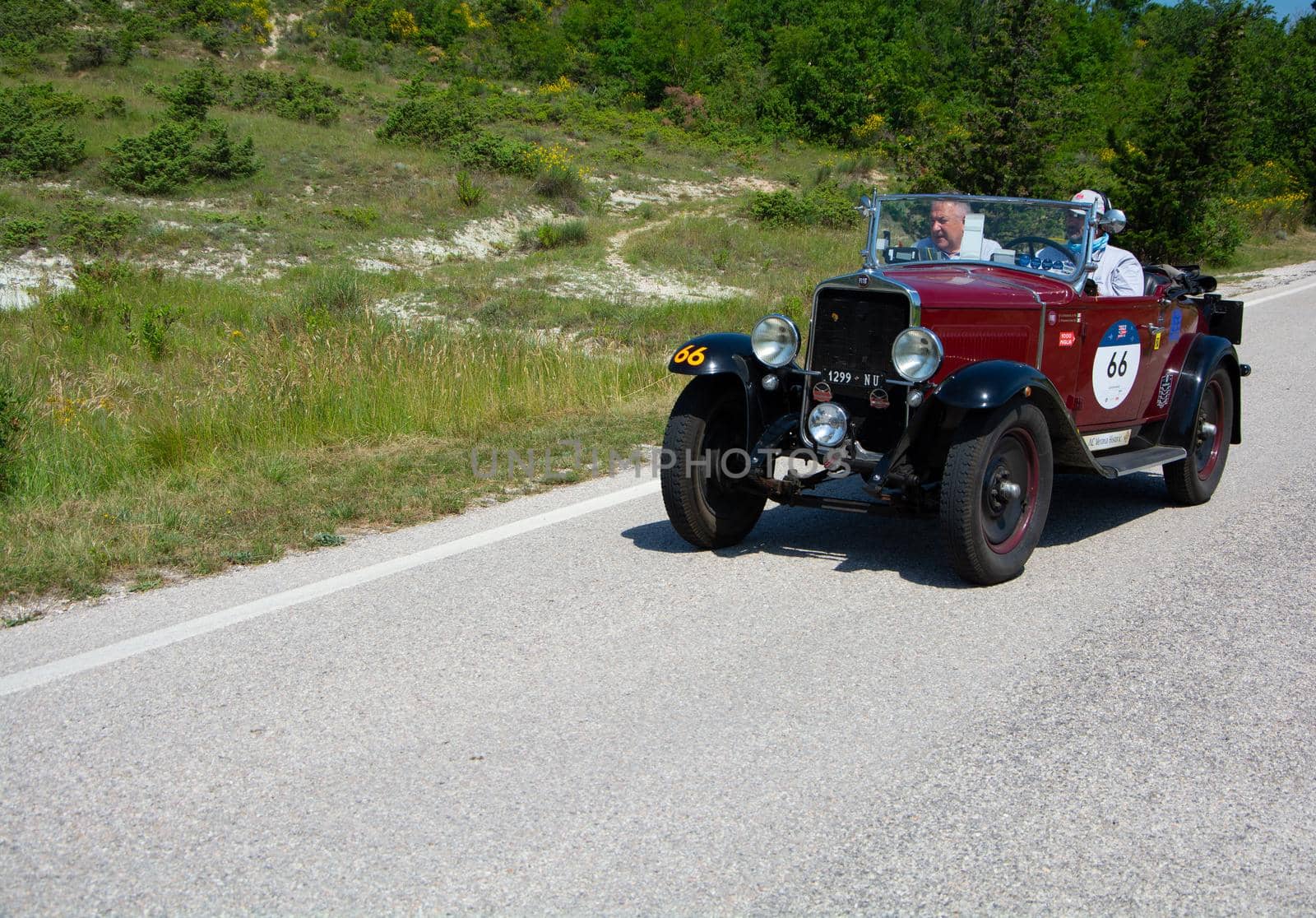 URBINO - ITALY - JUN 16 - 2022 : FIAT 514 S 1931 on an old racing car in rally Mille Miglia 2022 the famous italian historical race (1927-1957