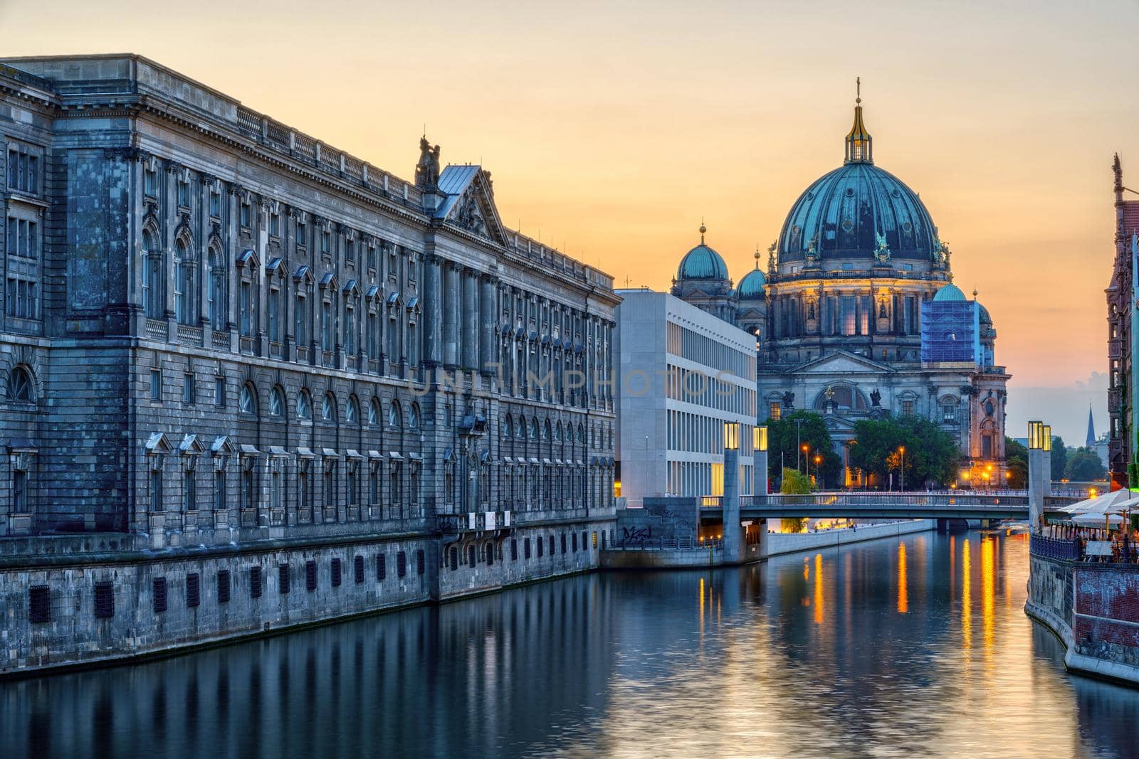 The river Spree in Berlin after sunset with the cathedral in the back