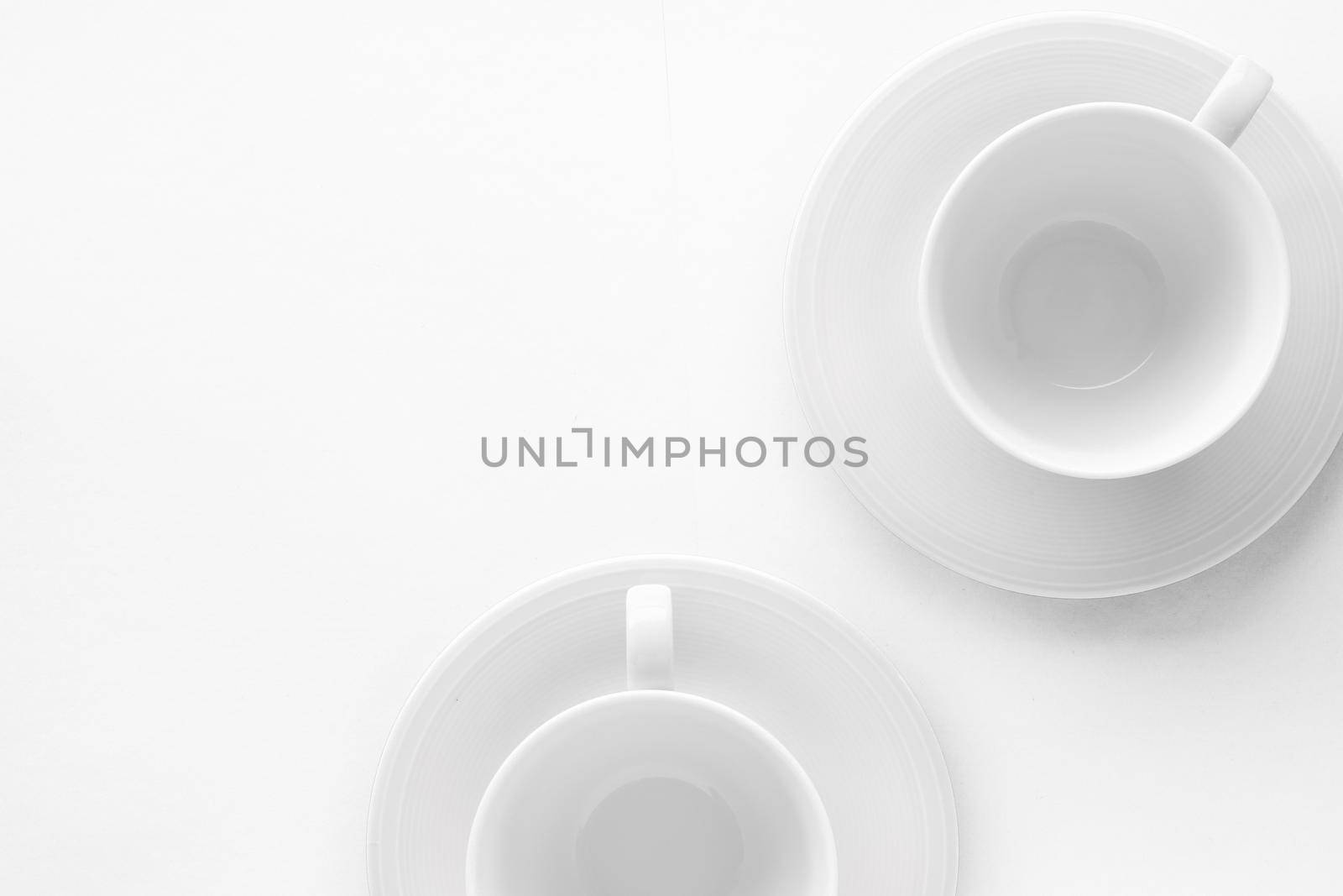 Kitchen, dishware design and drink concept - Empty cup and saucer mockup on white background, flatlay