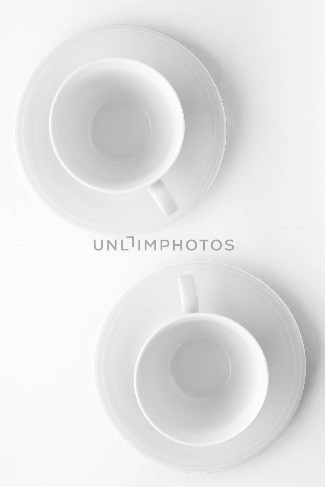 Kitchen, dishware design and drink concept - Empty cup and saucer mockup on white background, flatlay