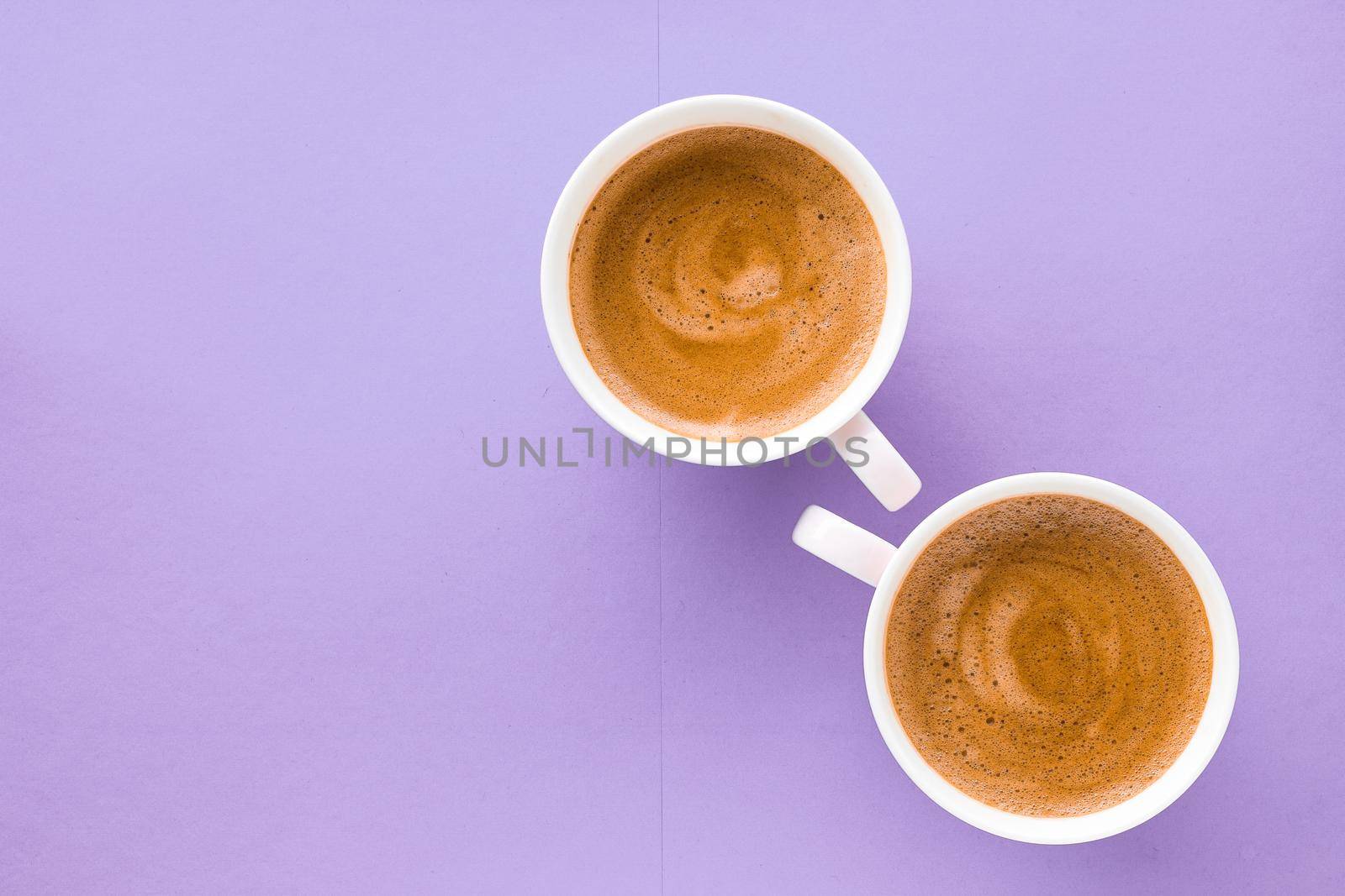 Breakfast, drinks and cafe menu concept - Coffee cup on purple background, top view flatlay