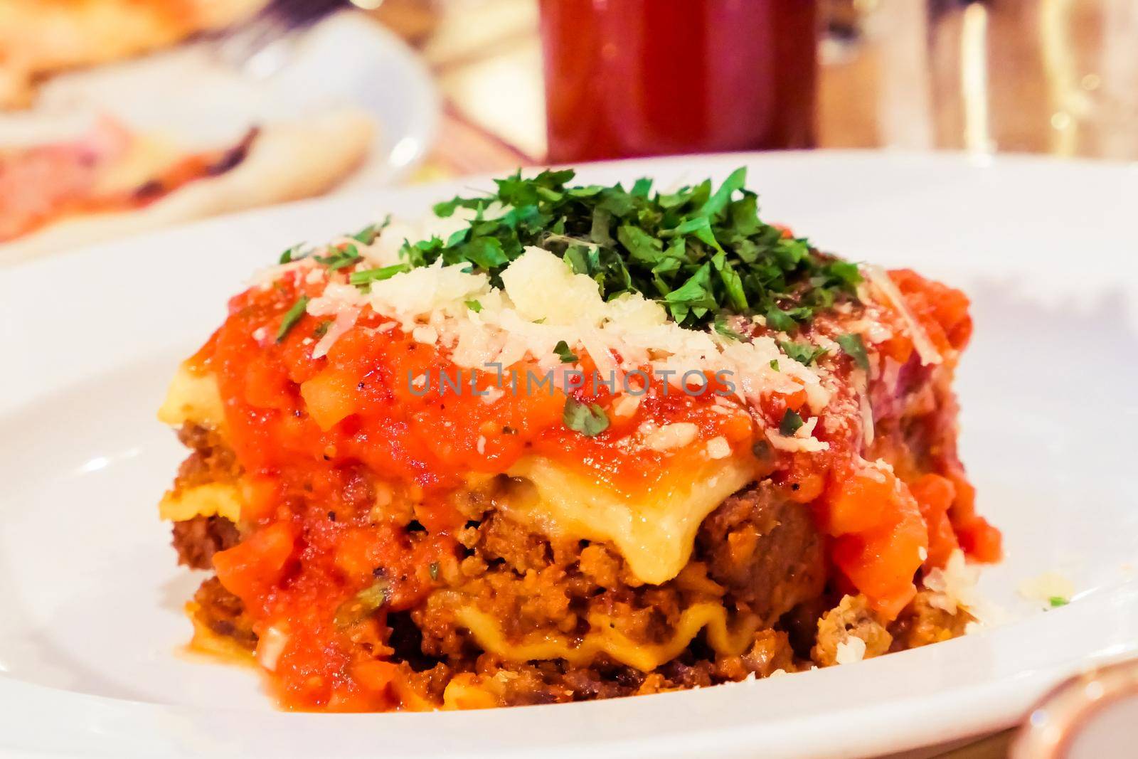 Italian cuisine, restaurant menu and food photography blog concept - Lasagna bolognese plate, traditional recipe with tomato sauce, cheese and meat