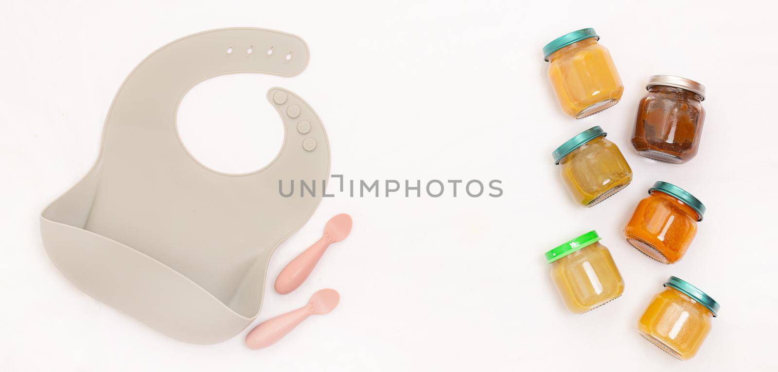 Layout of Puree for baby food with vegetables and fruits. Selective focus. nutrition. The first complementary feeding of the child. A happy child. A well-fed child. Copy space. by alenka2194