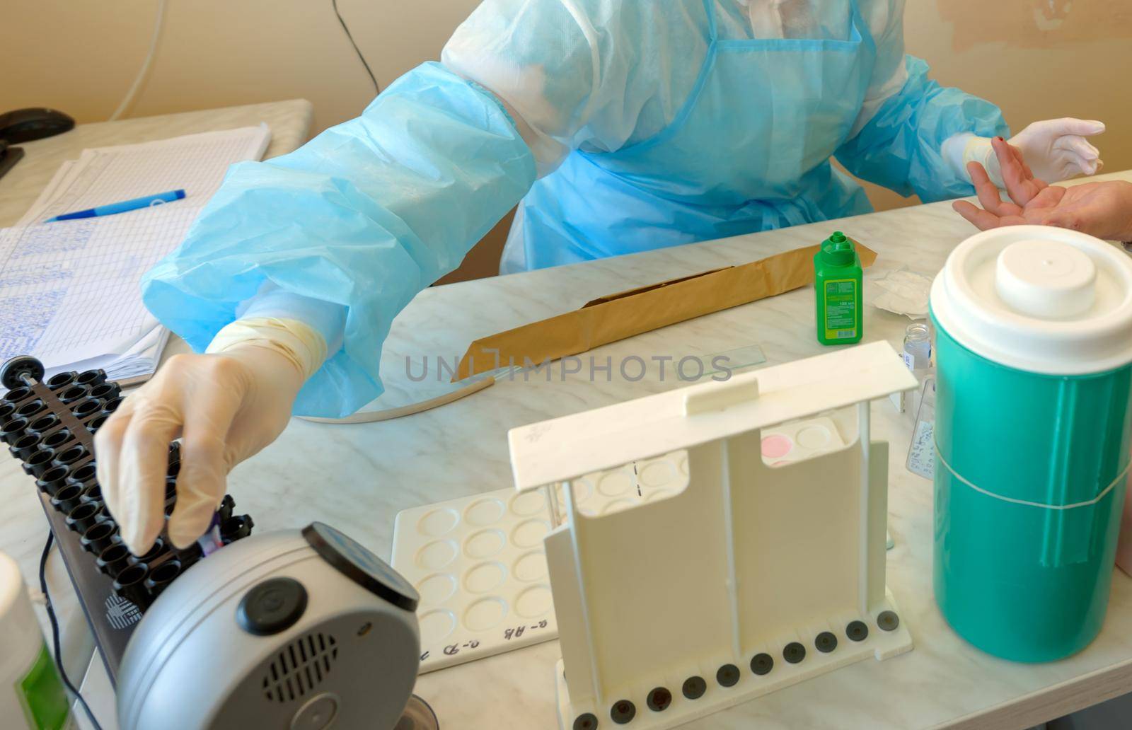 blood from fingers in a donor blood collection laboratory.