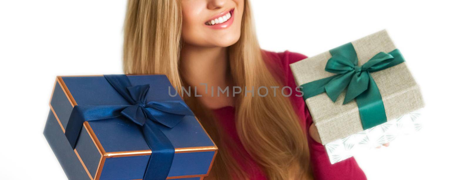 Birthday, Christmas gifts or holiday present, happy woman holding gift boxes isolated on white background by Anneleven