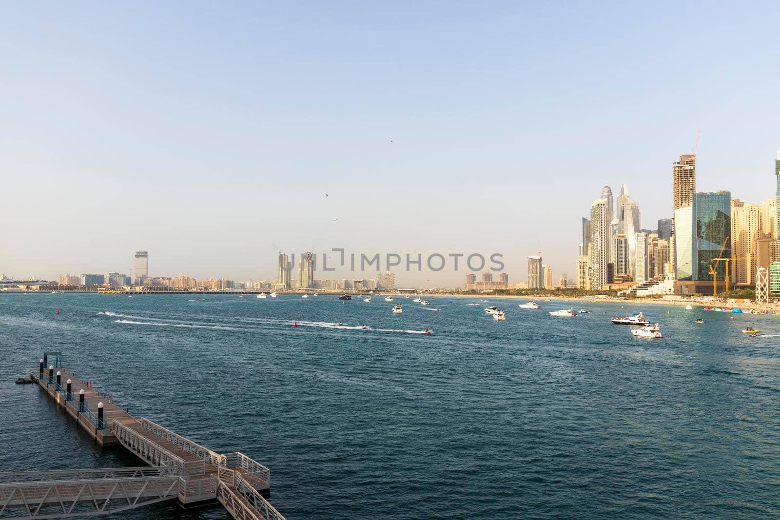 Dubai,UAE - 04.10.2021 Beach located at Jumeirah Beach residence area of Dubai. UAE. Outdoors by pazemin