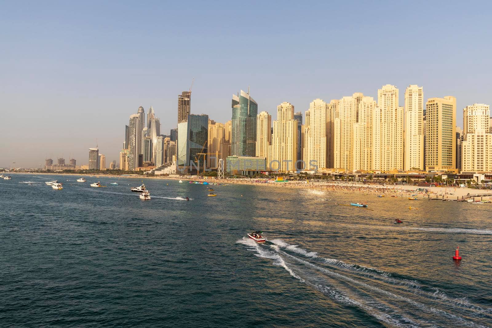 Dubai,UAE - 04.10.2021 Beach located at Jumeirah Beach residence area of Dubai. UAE. Outdoors by pazemin