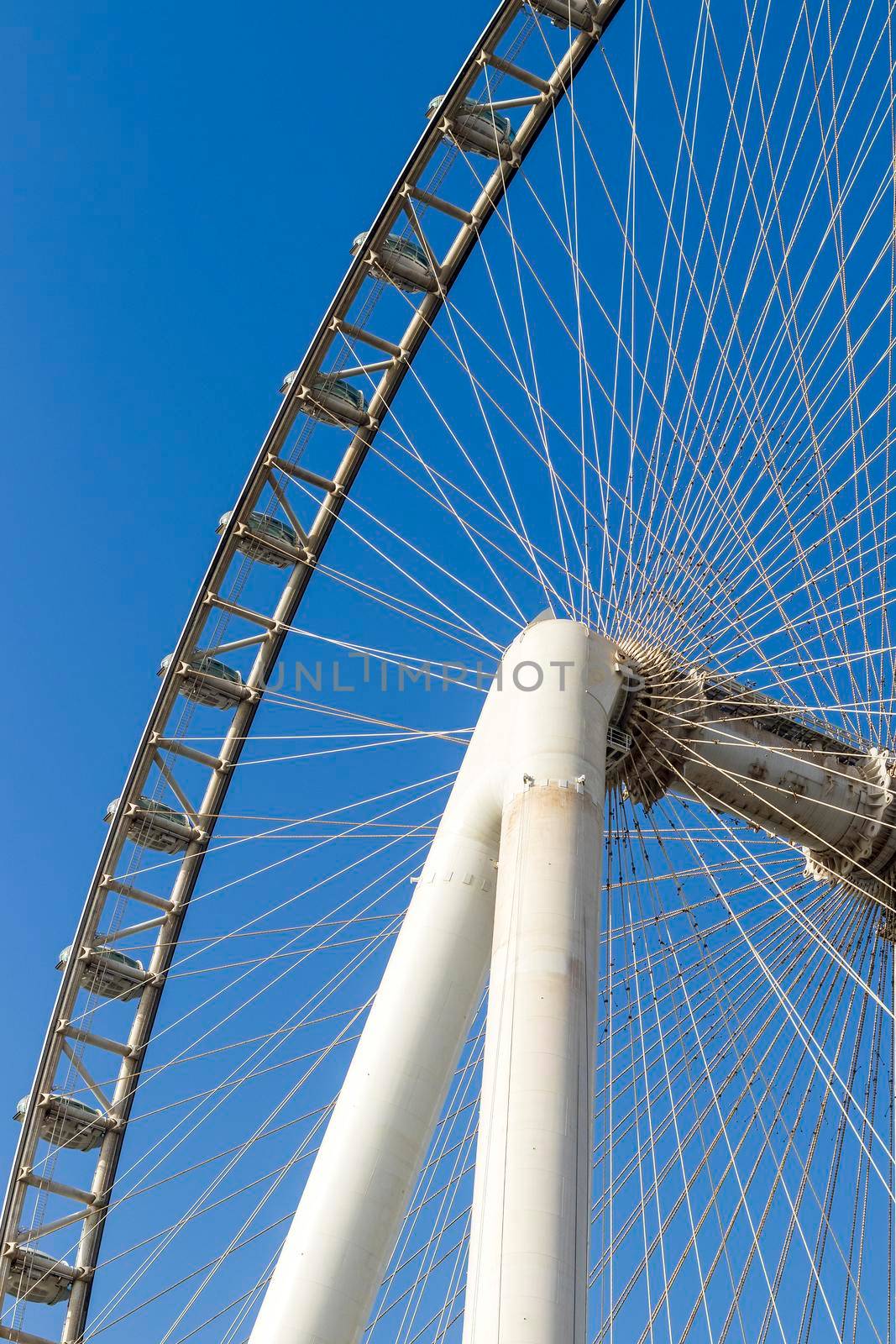 Dubai,UAE - 04.10.2021 Partial view of a tallest ferris wheel in the world Ain Dubai, located in "Blue waters" by Meraas in Dubai, UAE. Outdoors by pazemin