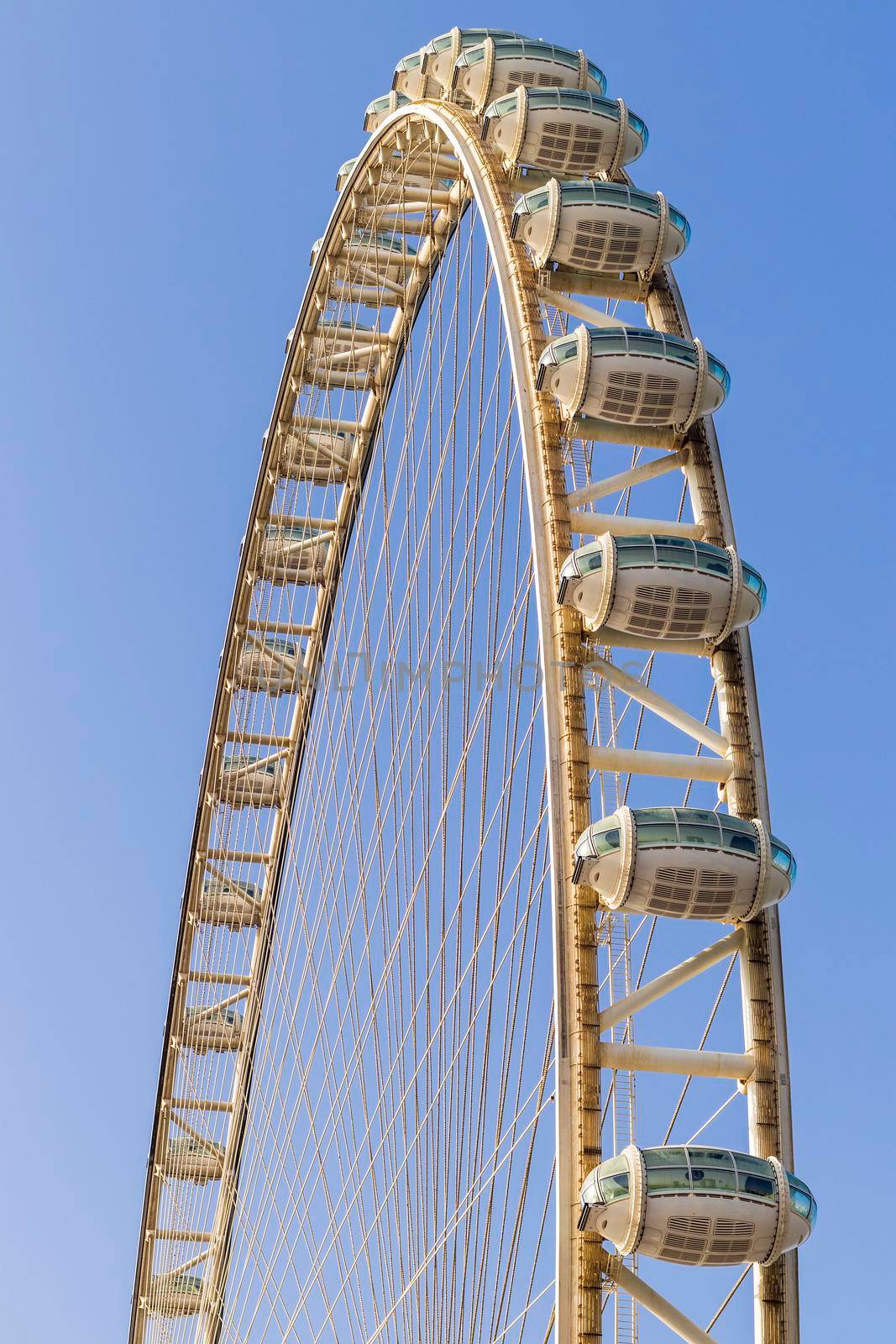 Dubai,UAE - 04.10.2021 Partial view of a tallest ferris wheel in the world Ain Dubai, located in "Blue waters" by Meraas in Dubai, UAE. Outdoors by pazemin