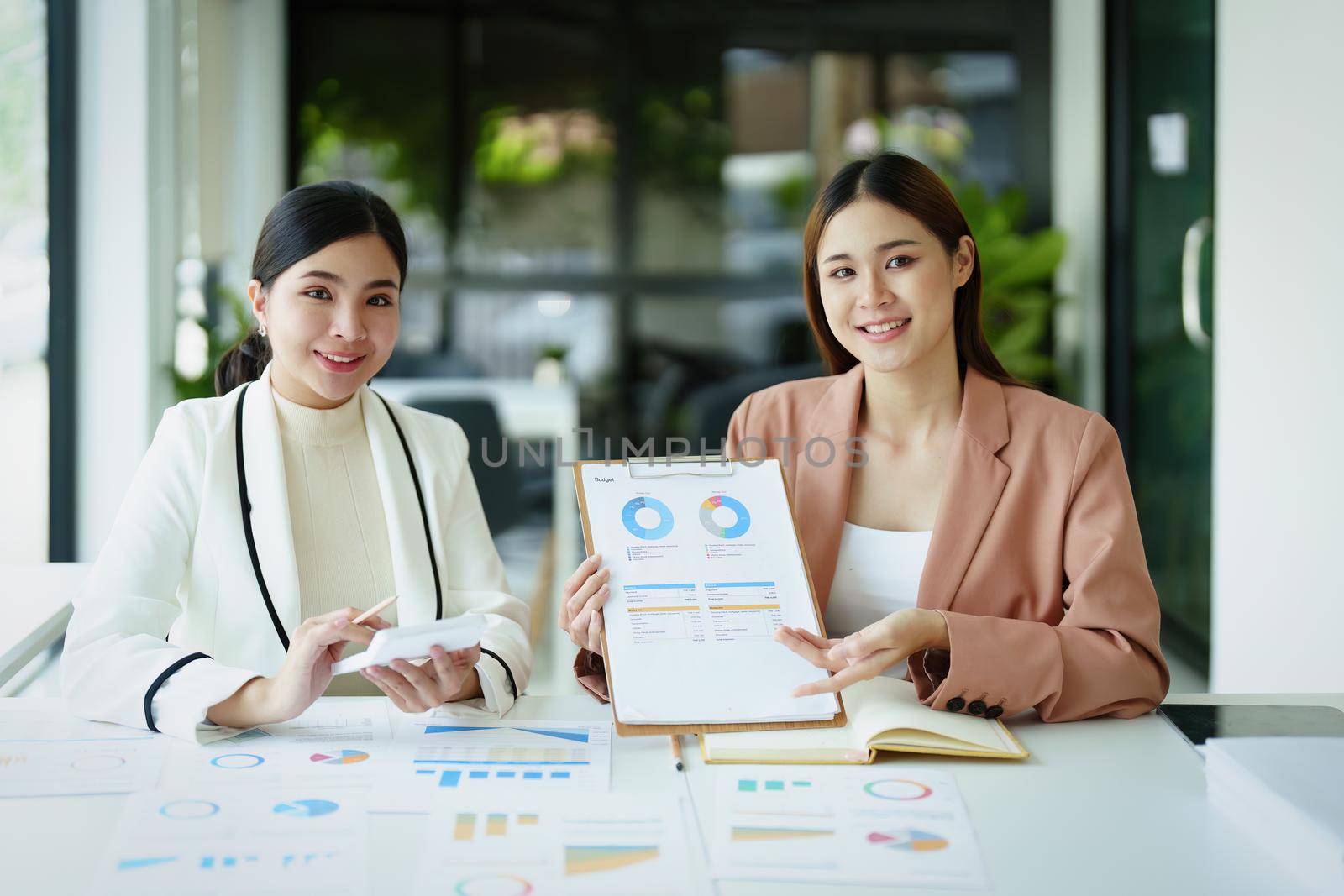 A portrait of a marketer and a salesperson offering products to customers in order to make a profit for the company.