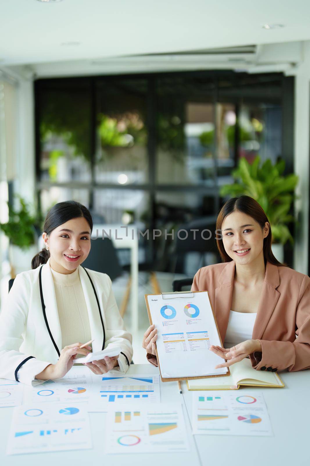 A portrait of a marketer and a salesperson offering products to customers in order to make a profit for the company.