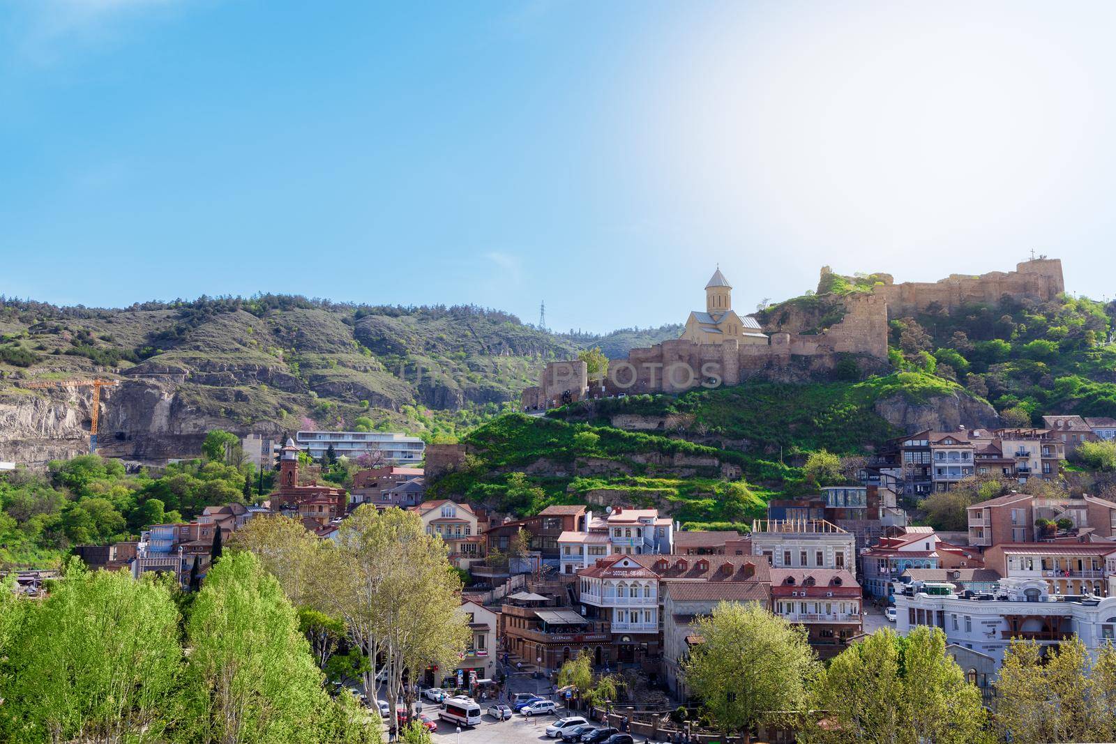 View of old city of Tbilisi, the capital of Georgia from above, on summer s day by Ramanouskaya