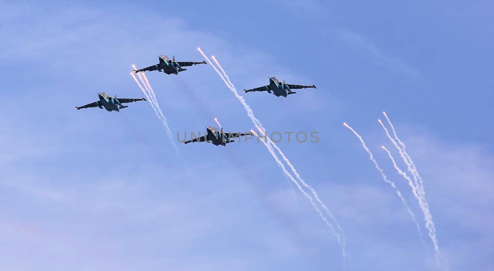 Su25 frogfoot attack aircraft close up in the sky with clouds. During an exercise in the Republic of Belarus.