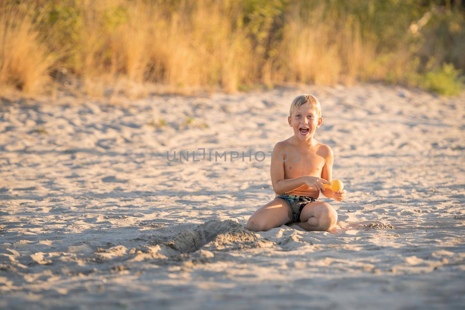 child laughing on the beach summer holidays by Robertobinetti70