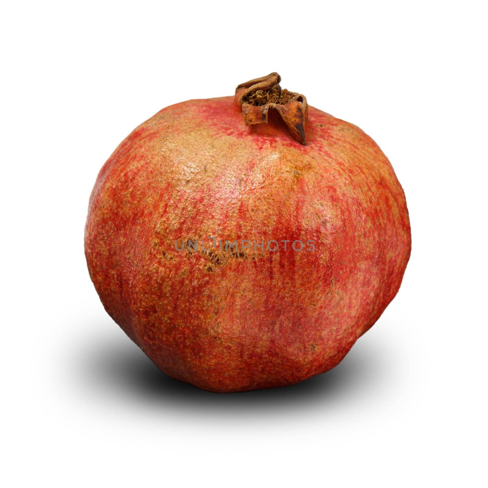 Pomegranate fruit on the white isolated background. Organic fruits.