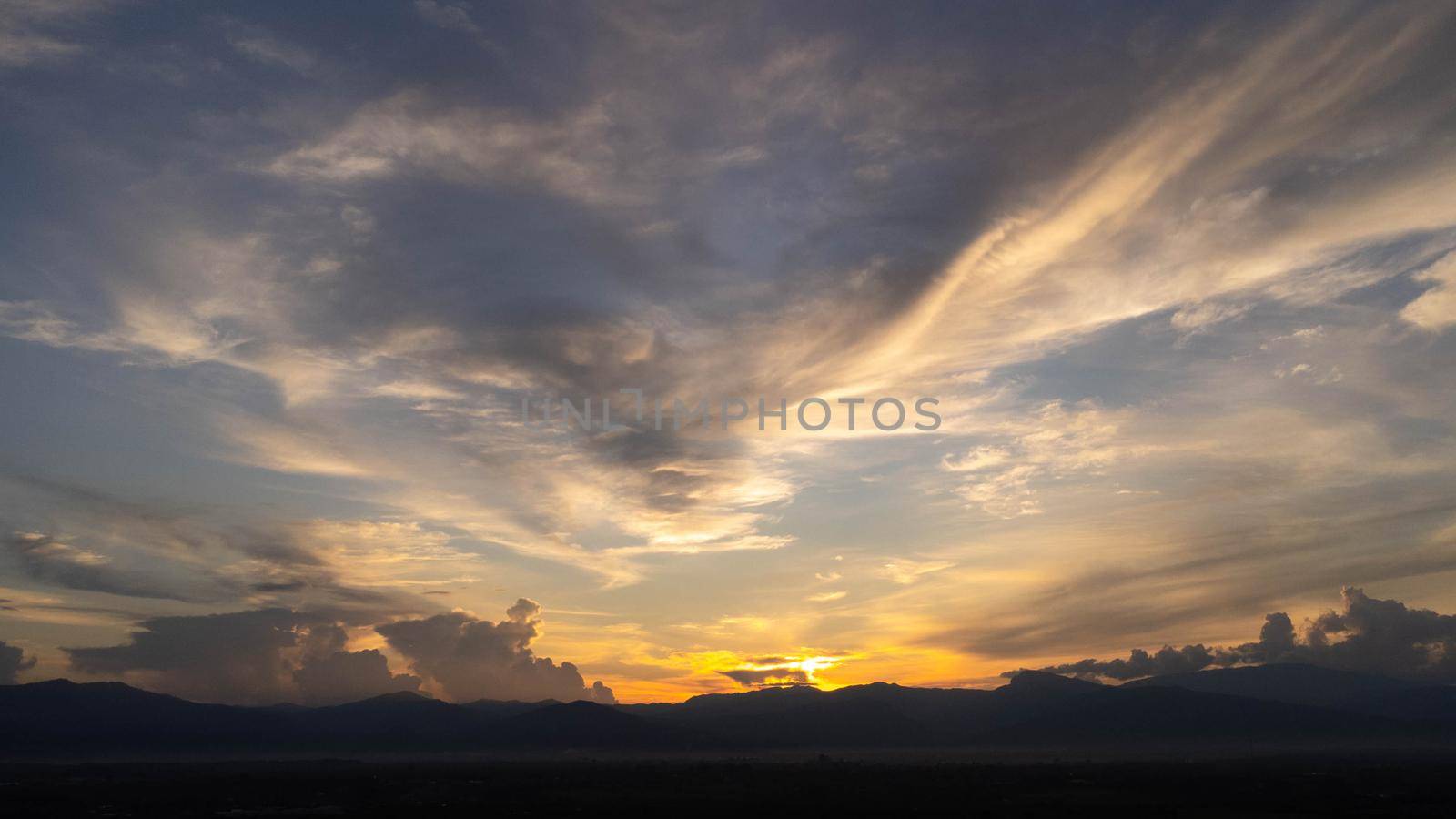 Aerial view of the sunset on the mountains in northern Thailand. Beautiful landscape nature background.
