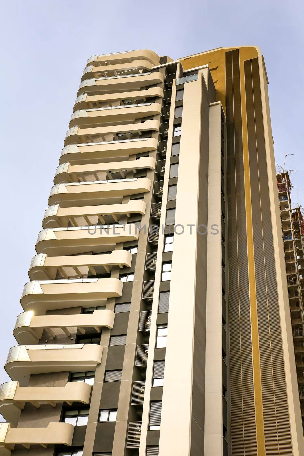 Benidorm, Alicante, Spain- September 11, 2022: Modern architecture building called Sunset Cliffs in the Poniente Beach Area in Benidorm