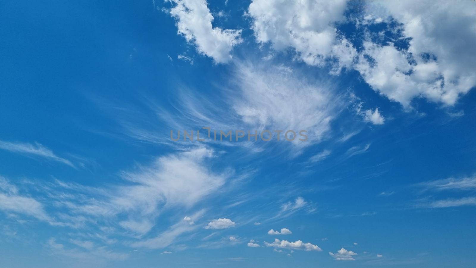 Blue sky with clouds. Beautiful natural background. Ready to wallpaper by anytka