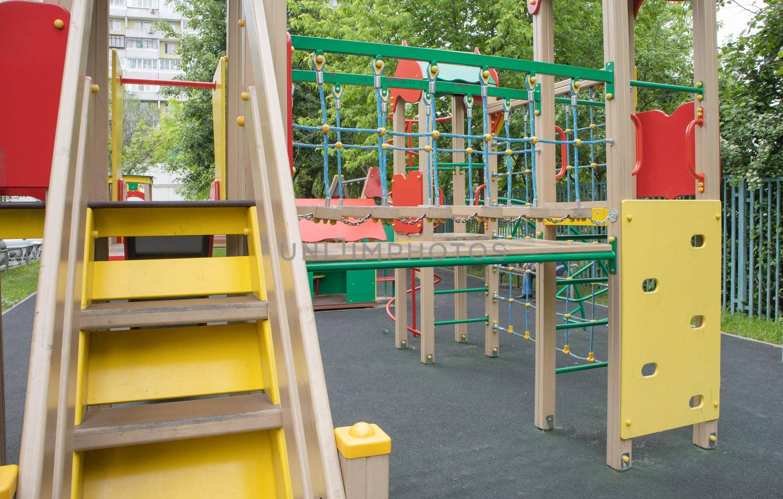 Colorful playground in the yard in the park. Safe playground for children, MODERN COMPLEX.