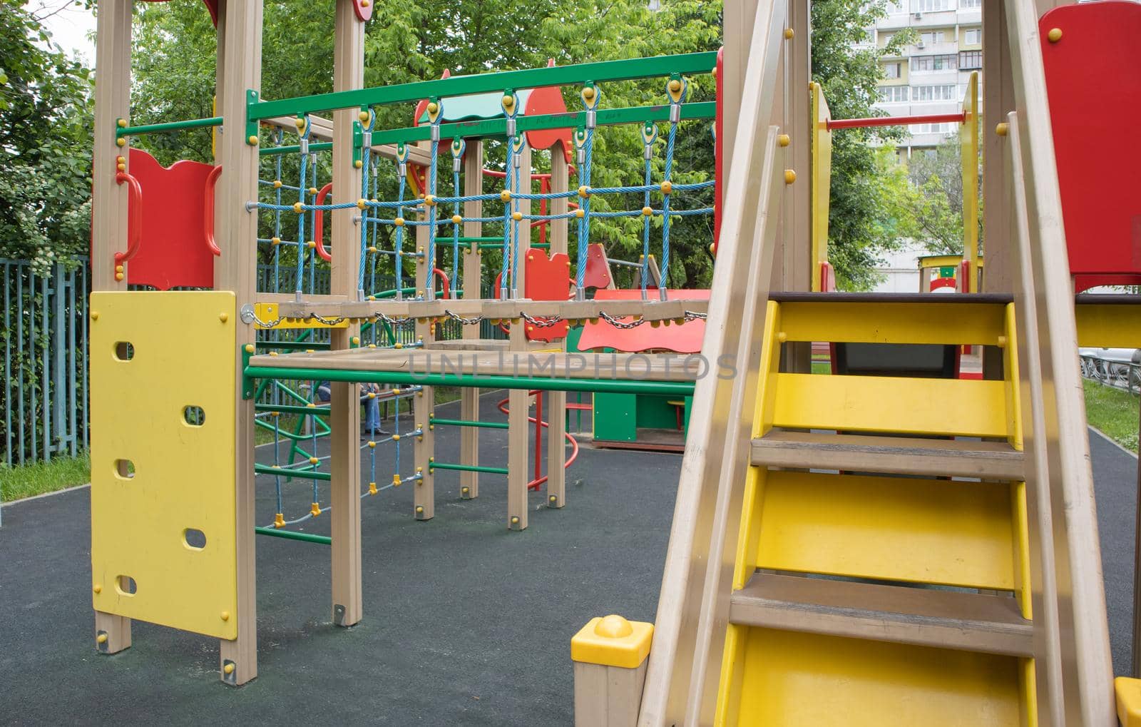Colorful playground in the yard in the park. Safe playground for children, MODERN COMPLEX.