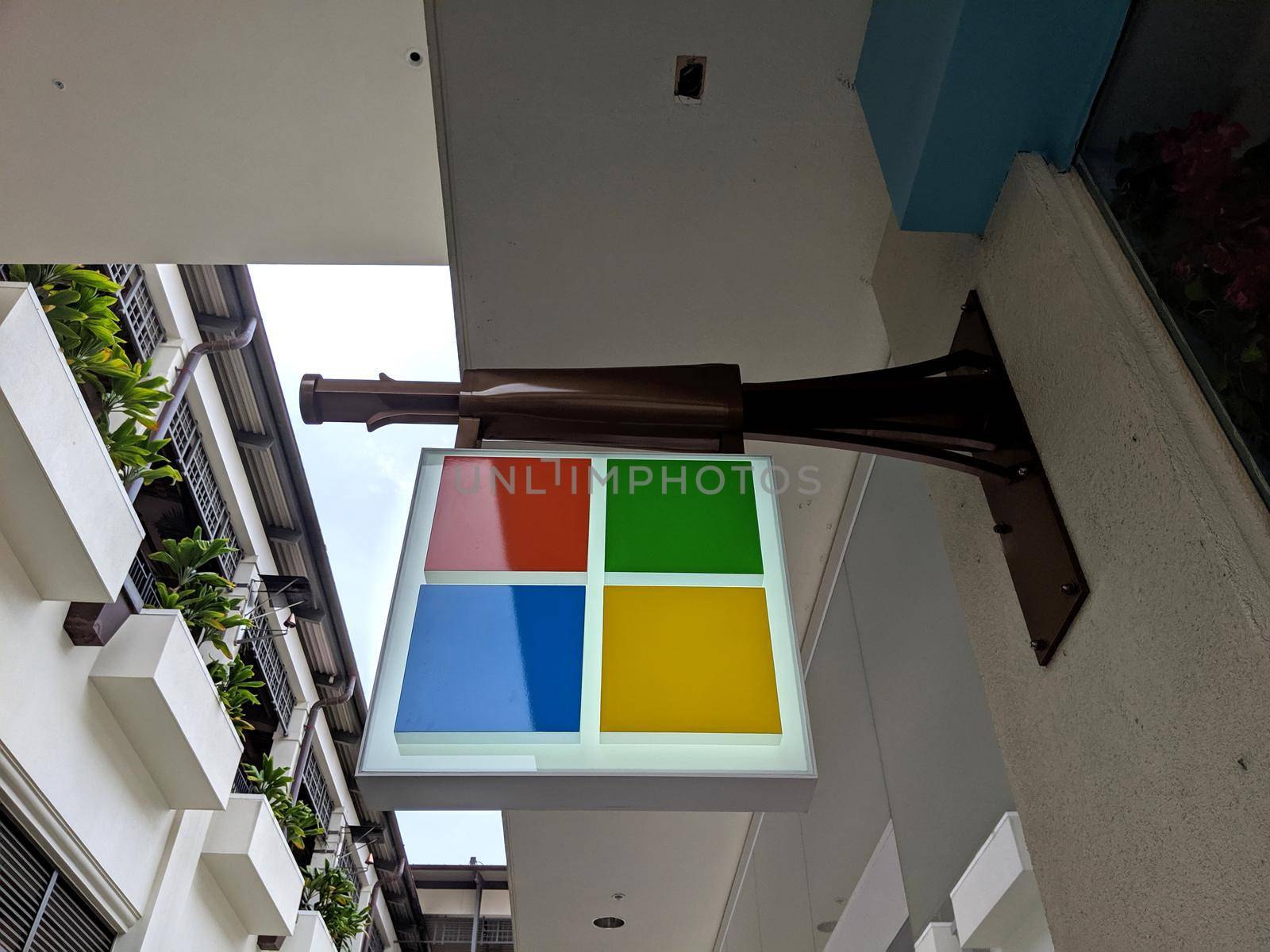 Honolulu - August 30, 2019: Microsoft store sign logo featuring window with four colors orange, blue, yellow, and green in Ala Moana Mall.  
