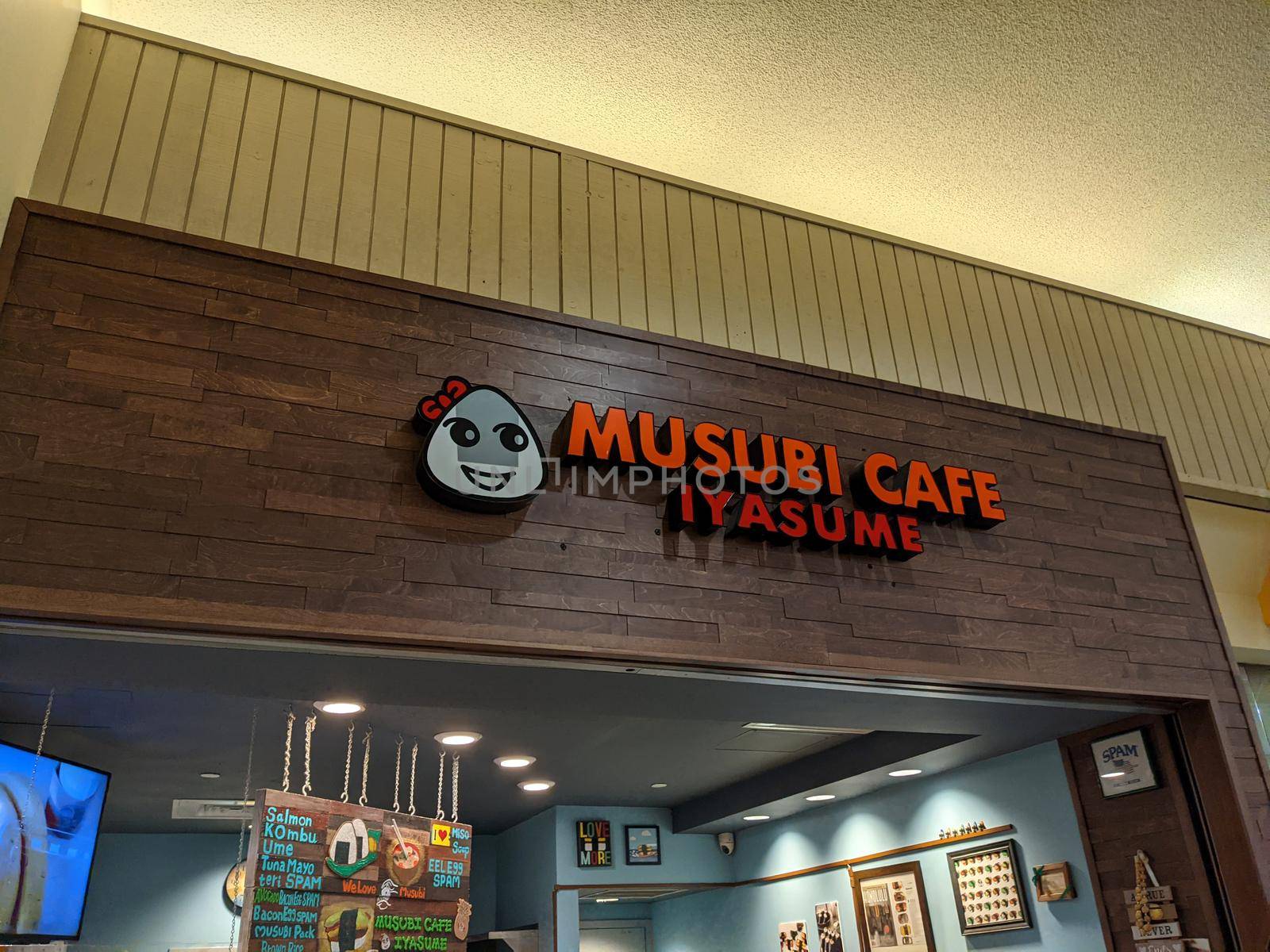 Honolulu - July 5, 2021:  Musubi Cafe Iyasume sign above store in the Kahala Mall.