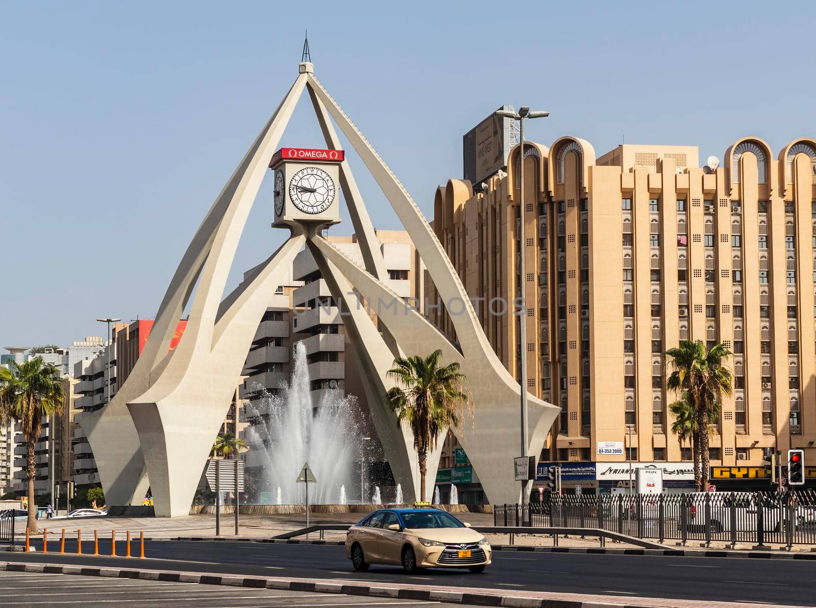 Dubai, UAE - 07.14.2021 One of the oldest landmarks, clock tower roundabout.