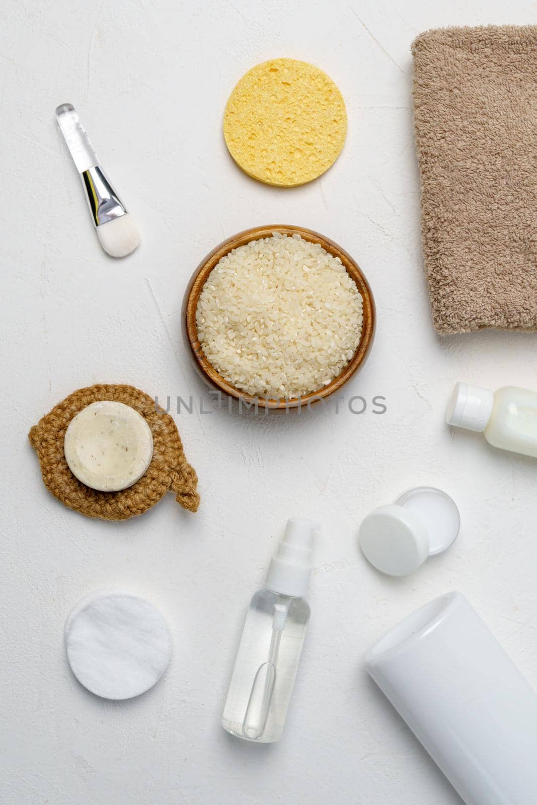 Rice for skin care face cleansing cosmetic product. Natural beauty treatment hygiene. Fermented beauty care concept. Vertical photo
