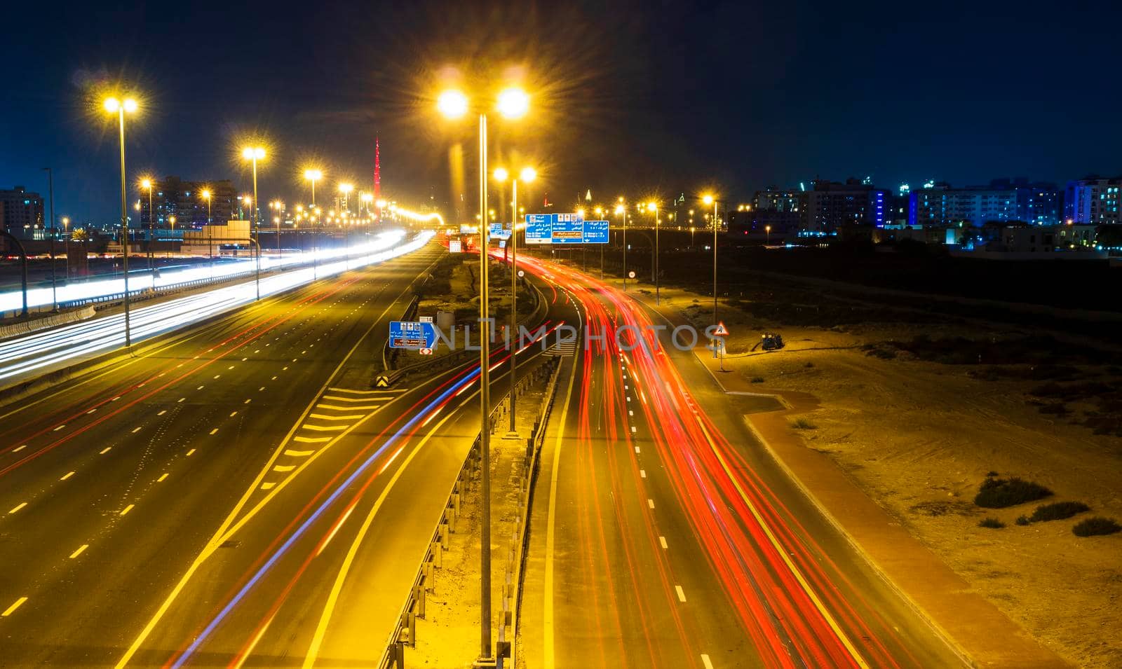 Dubai, UAE - 02.22.2021 Shot of a night road with light trails.