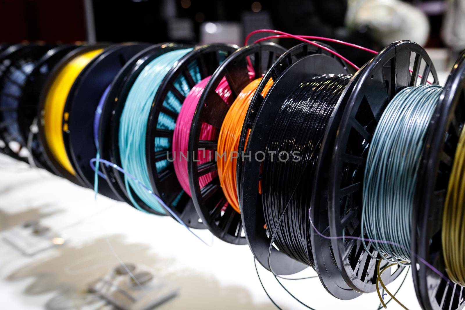 Lots of different coils with Colorful plastic PLA and ABS with filament for printing on a 3D pen.