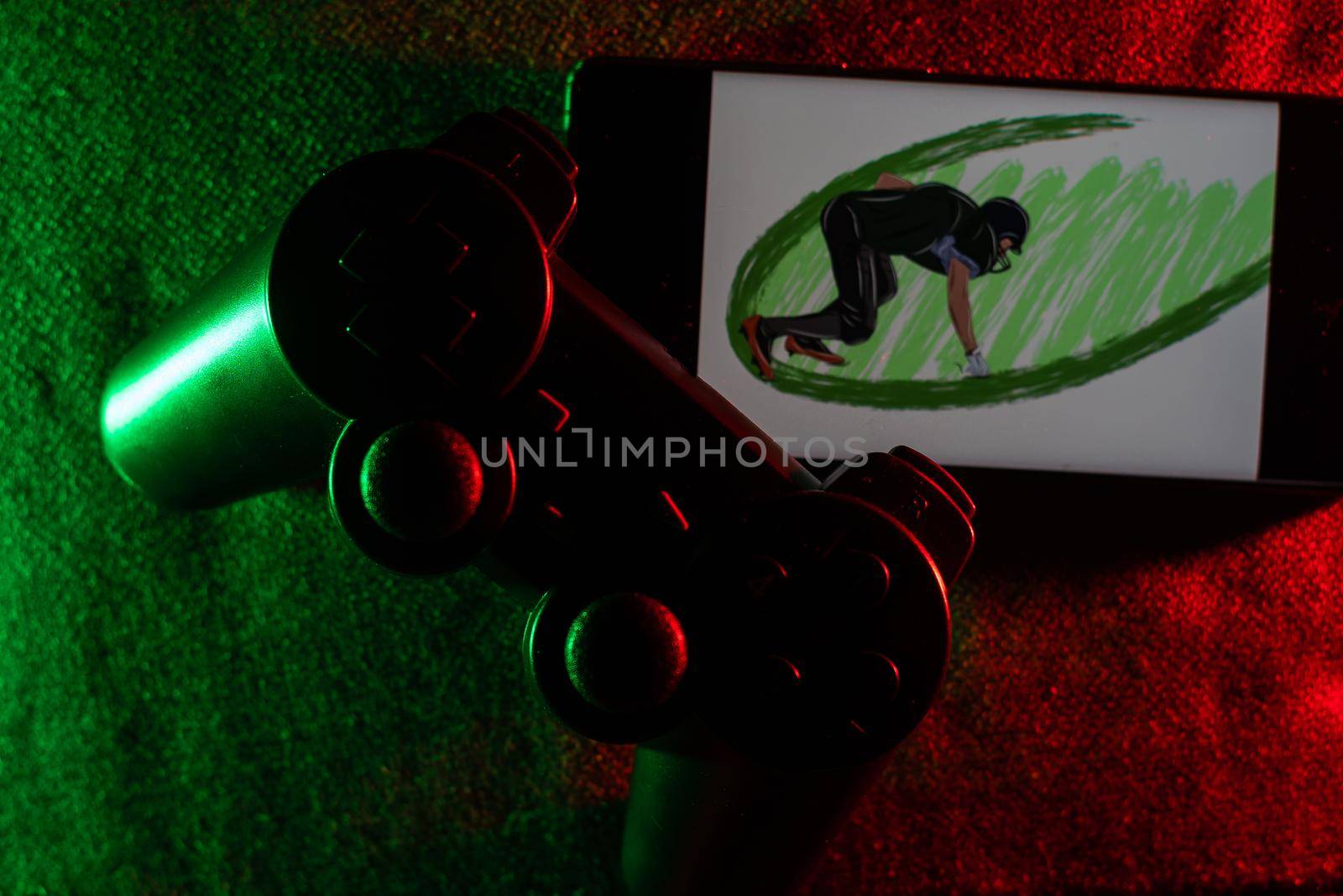 Gamer work space concept. gaming set up. top view of a gaming gear, joystick and a smartphone.