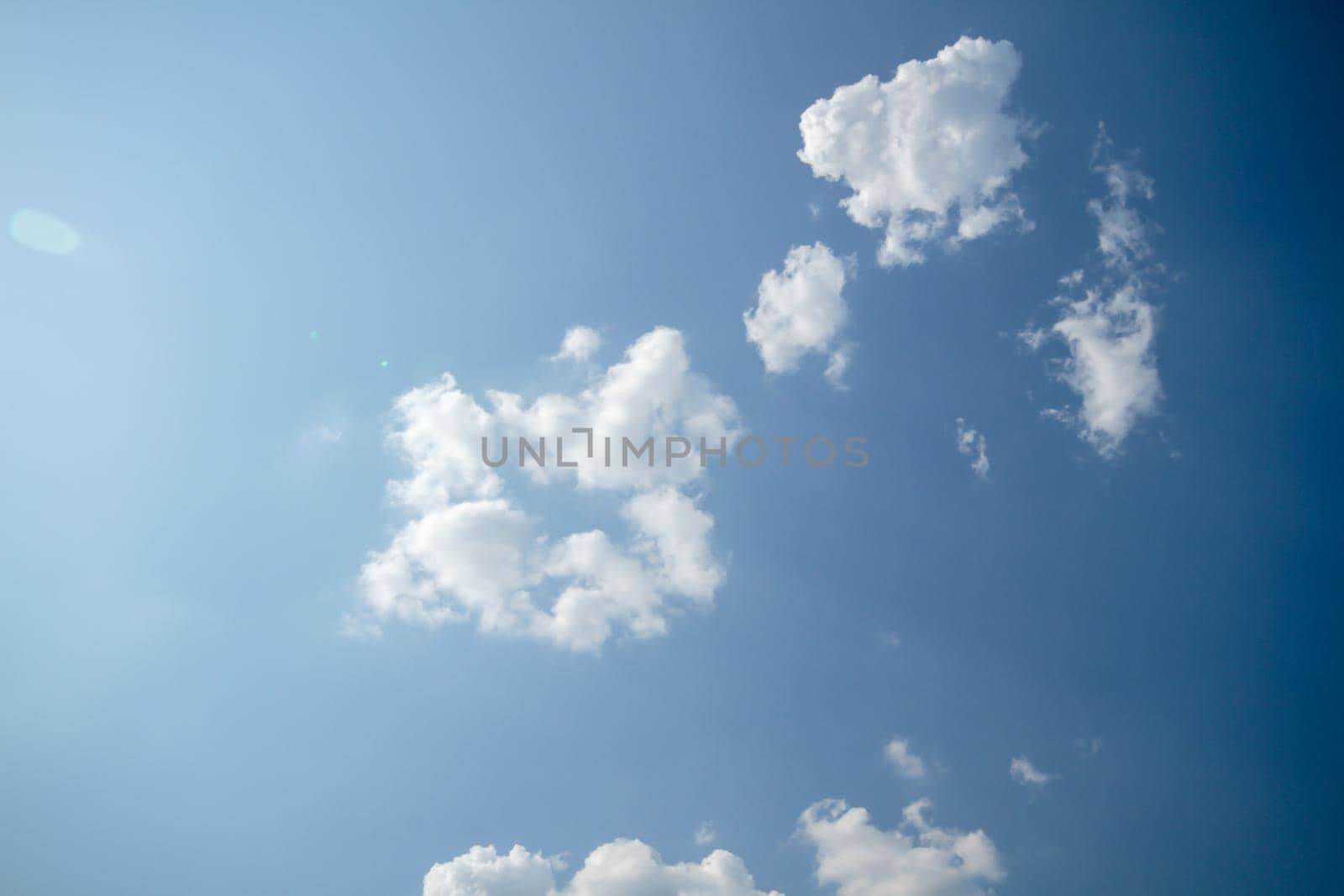 Beautiful blue sky and clouds natural background by alex_nako