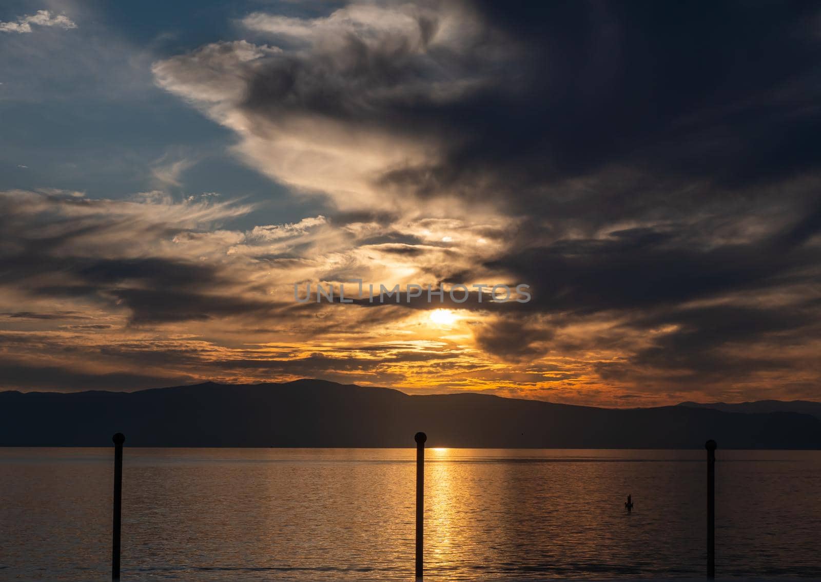 Beautiful calm lake with sunset by alex_nako