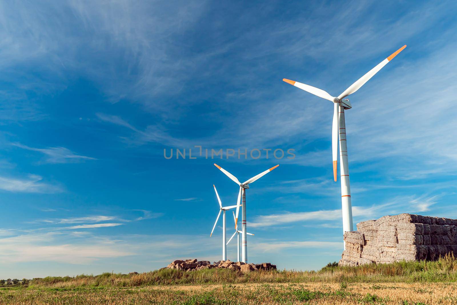 Green energy on wind turbines and wind turbines. Alternative energy sources and renewable energy sources. Power generation and generators of power plants.Wind farm and wind,environmental conservation