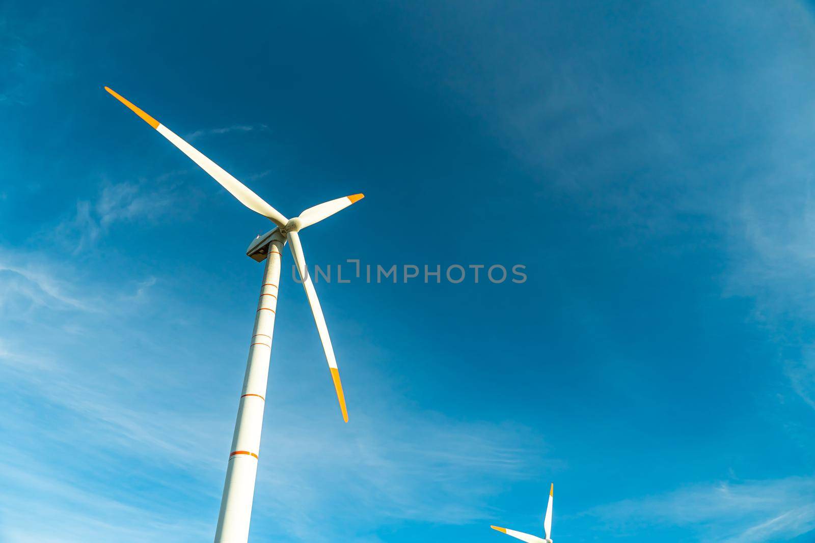 Green energy on wind turbines and wind turbines. Alternative energy sources and renewable energy sources. Power generation and generators of power plants.Wind farm and wind,environmental conservation