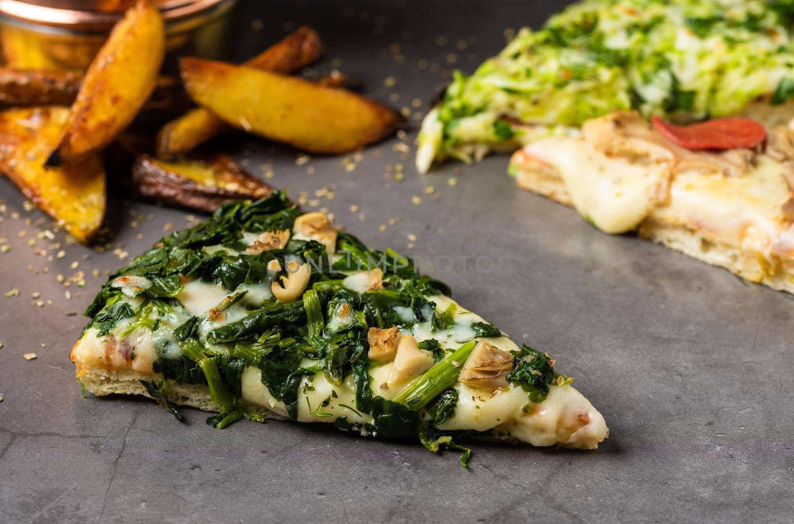 Assorted handmade Argentinian pizza on stone background