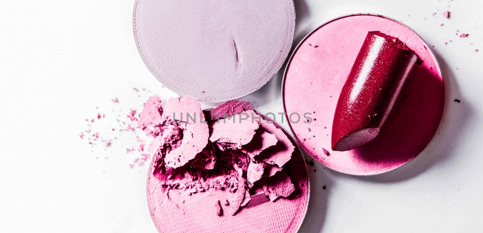 Beauty texture, cosmetic product and art of make-up concept - Crushed eyeshadows and lipstick isolated on white background