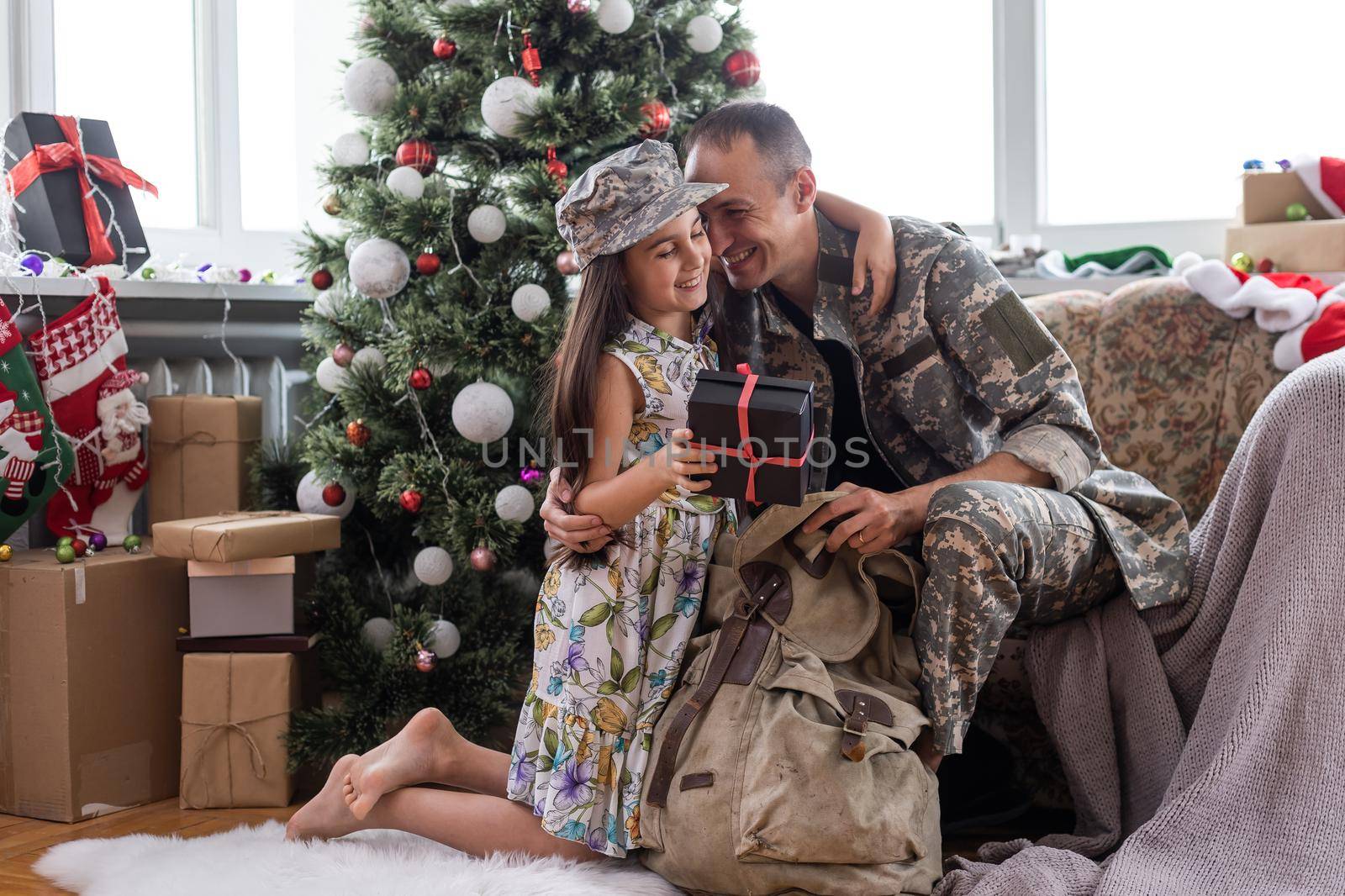 military with daughter at christmas by Andelov13