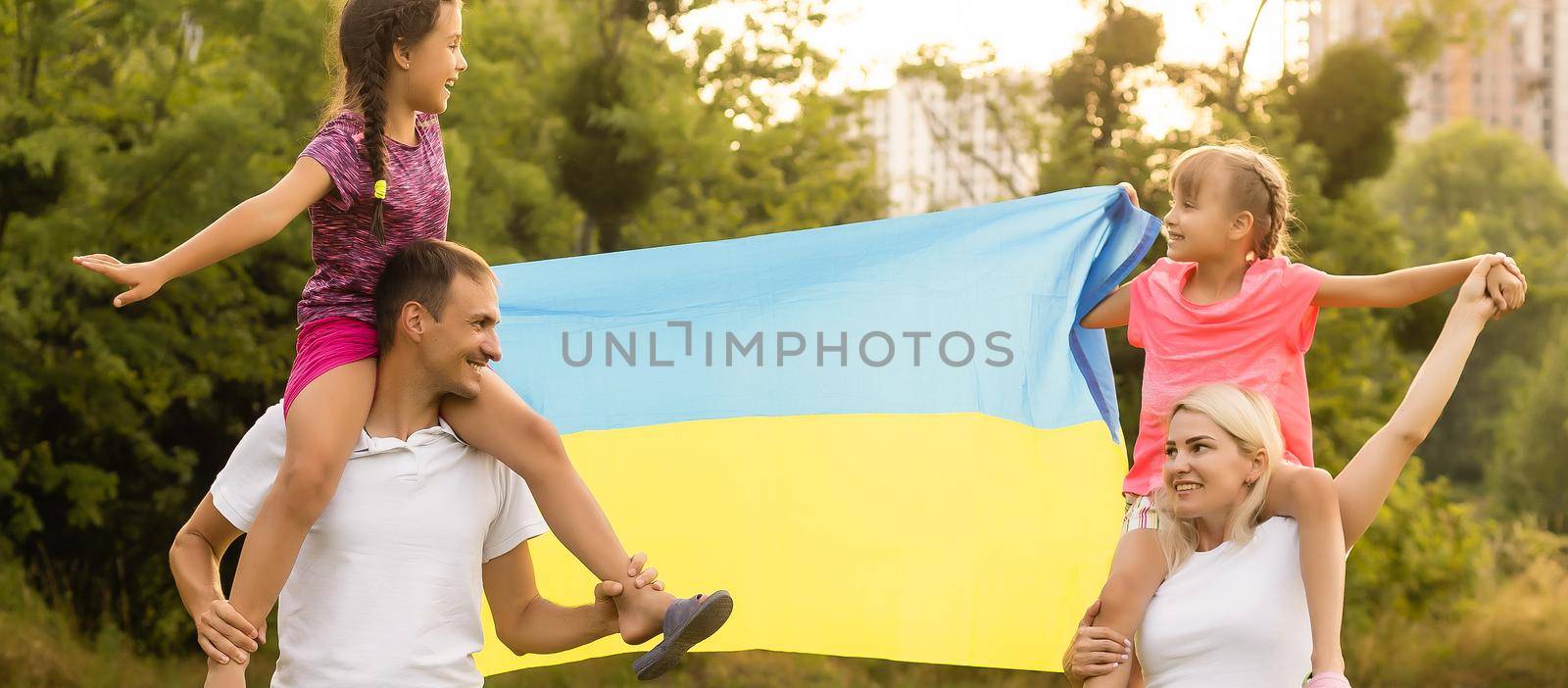 family with the flag of ukraine.