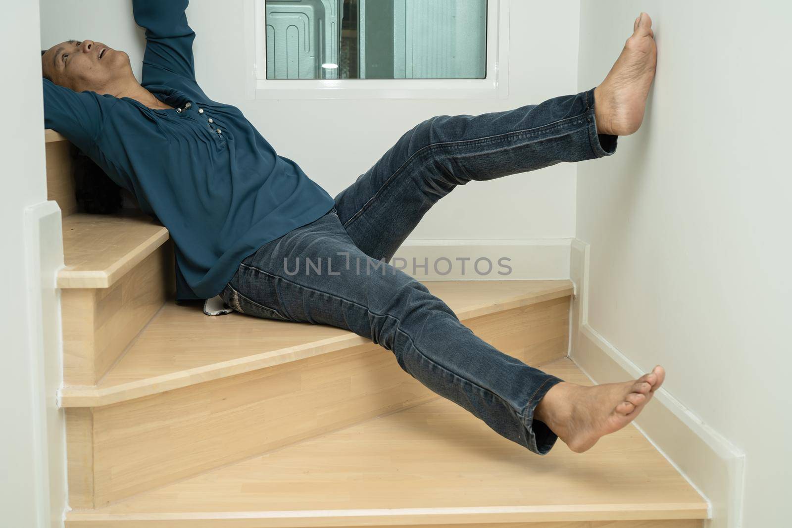 Asian lady woman patient fall down the stairs because slippery surfaces by pamai