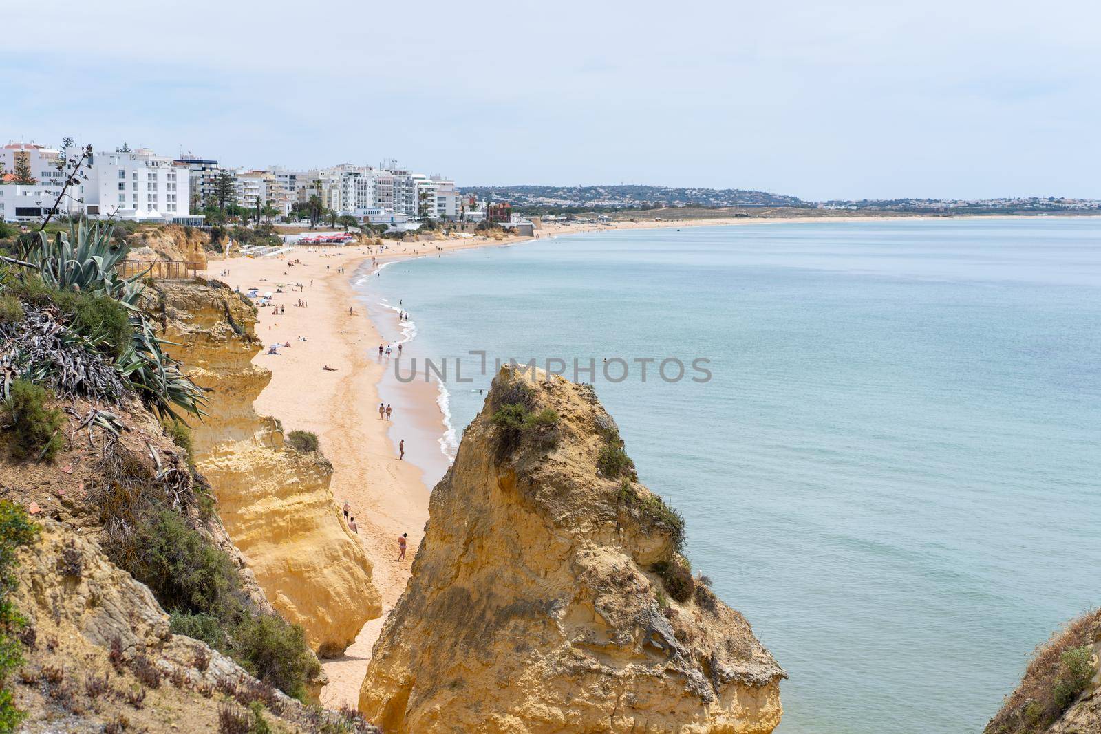 Armacao de Pera Algarve Portugal. Beautiful view on Atlantic ocean at day time and city. High quality FullHD footage