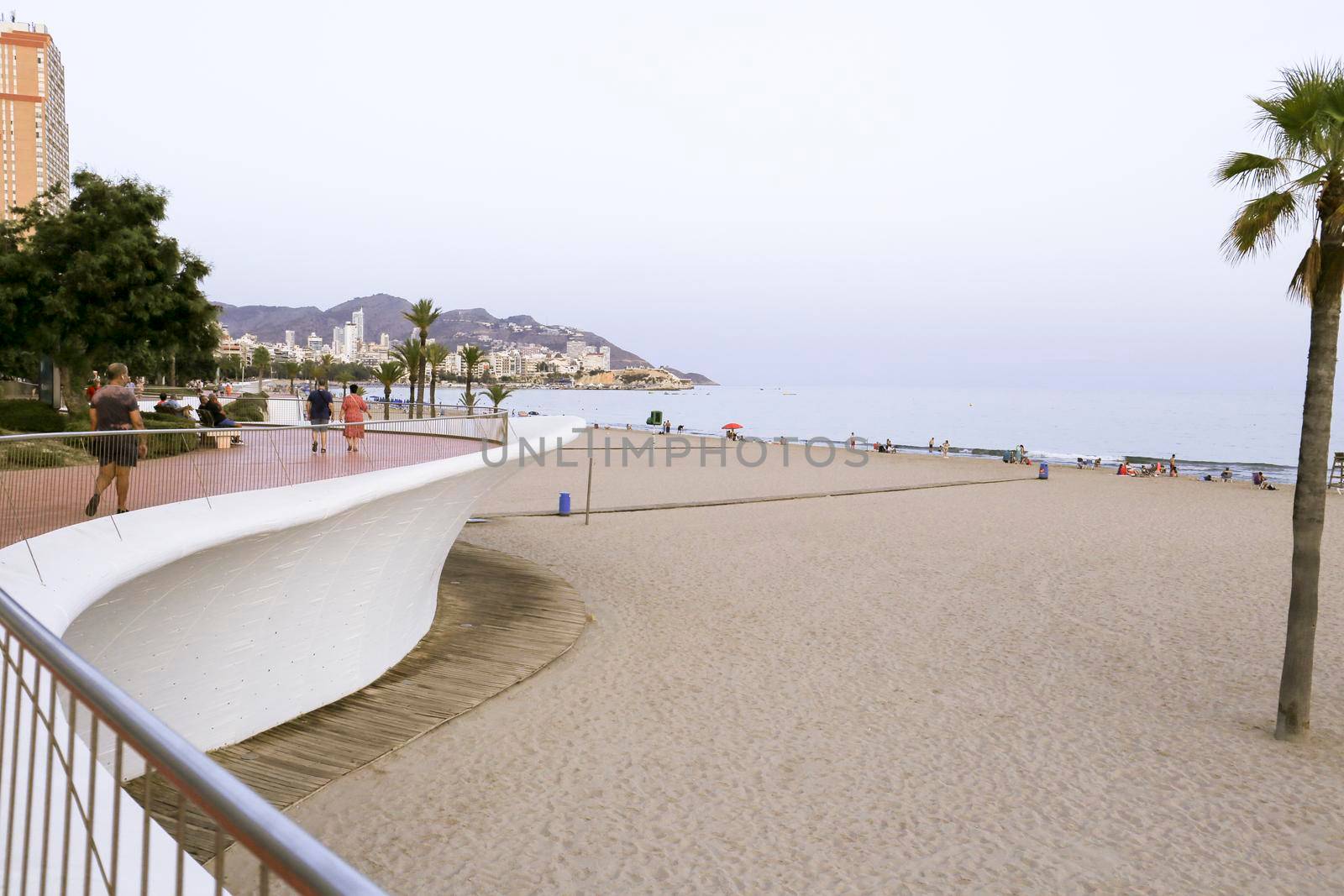 Benidorm, Alicante, Spain- September 11, 2022: Poniente beach with its beautiful promenade with access to the beach and viewpoint with modern design