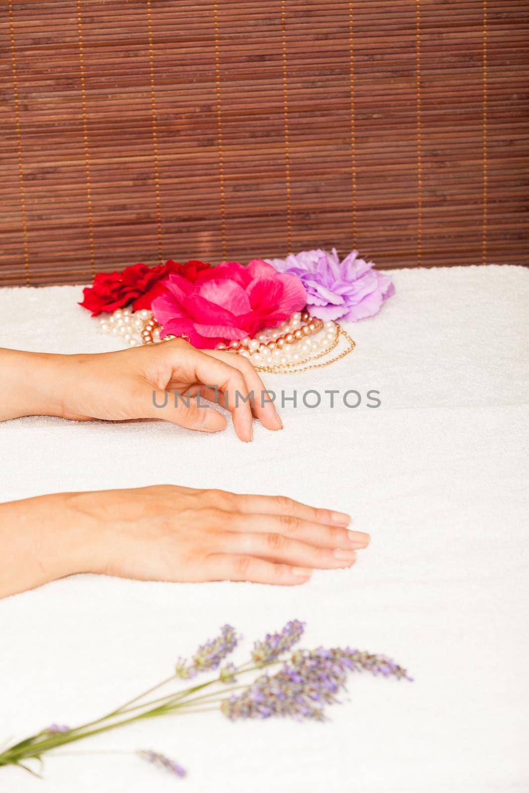 Preparing a woman's hands for a manicure