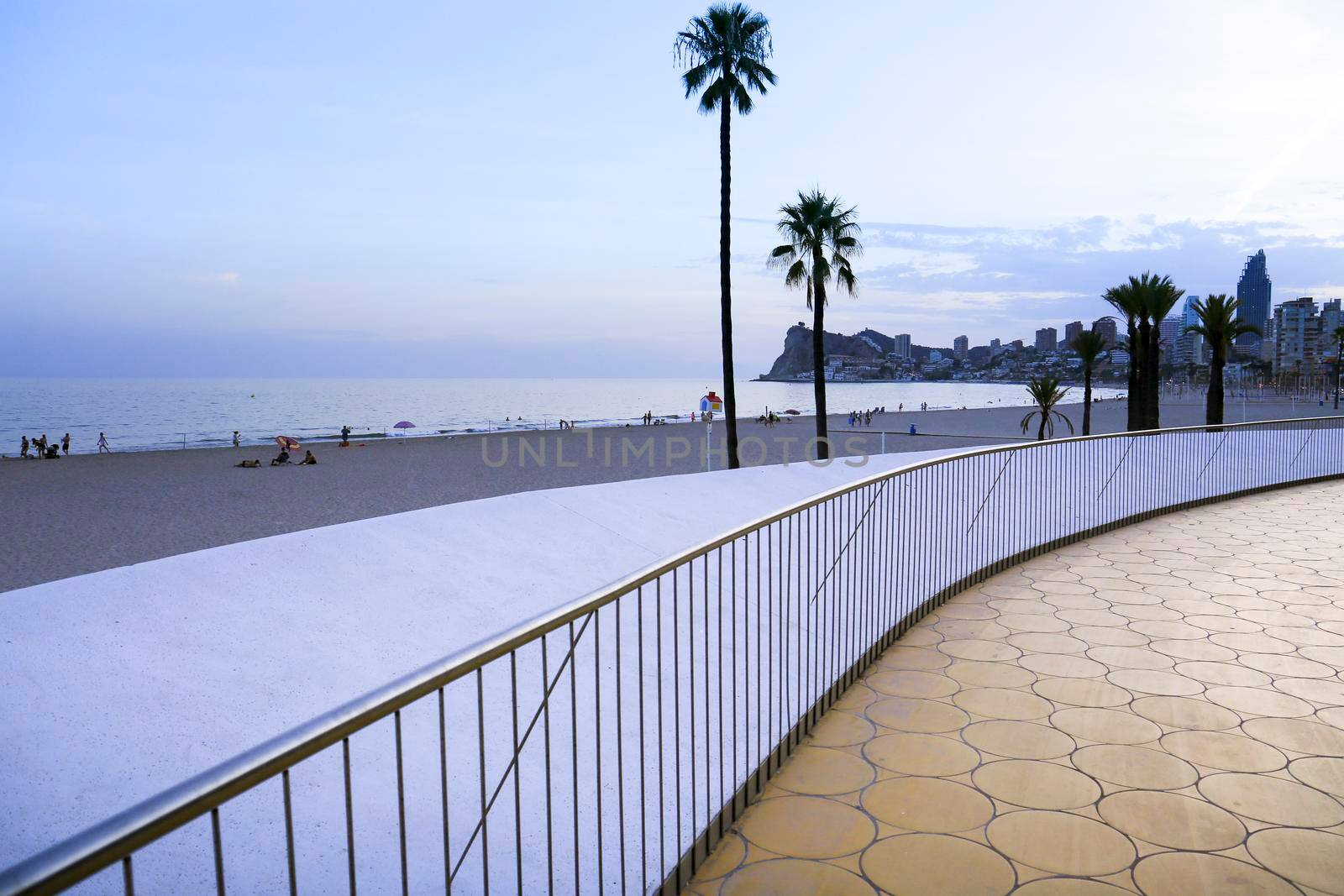 Benidorm, Alicante, Spain- September 11, 2022: Poniente beach with its beautiful promenade with access to the beach and viewpoint with modern design